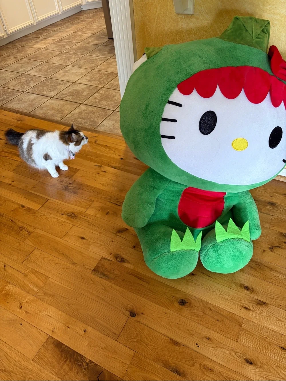 Hello Kitty Green Plush Character with Red Bow